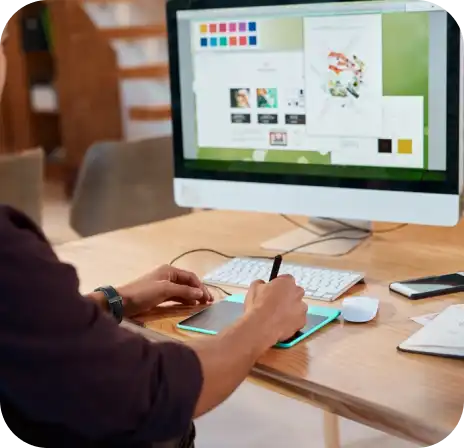 About Us a person using a tablet and a keyboard